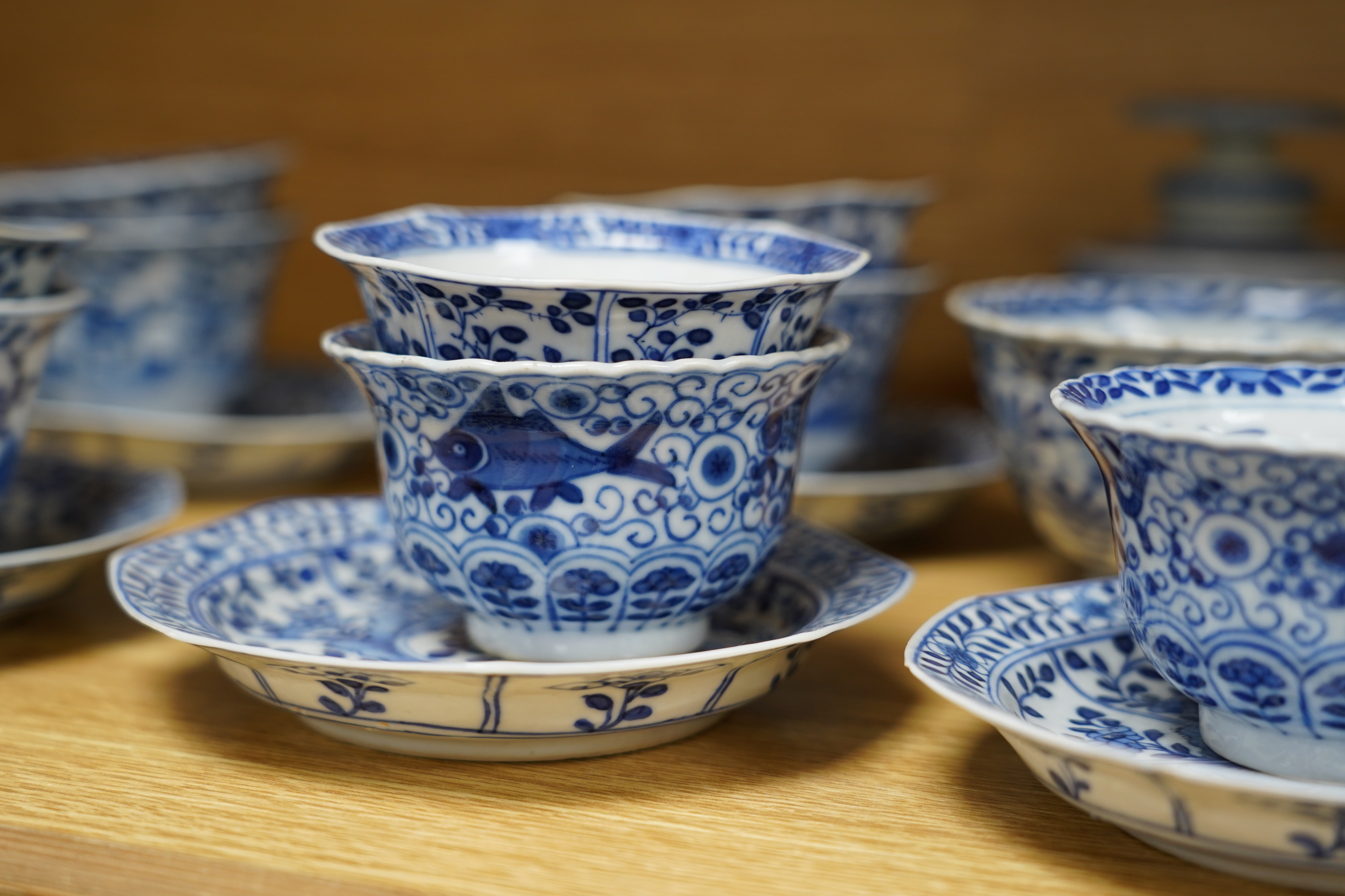 A quantity of 19th century Chinese blue and white porcelain including pair of baluster jars and covers and tea bowls, largest 14cm high